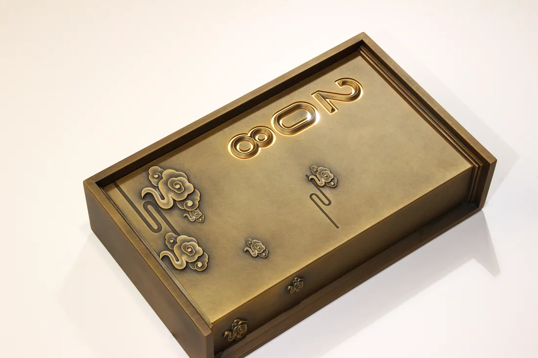 Antique brass stainless box plaque with number 208 and cloud motifs