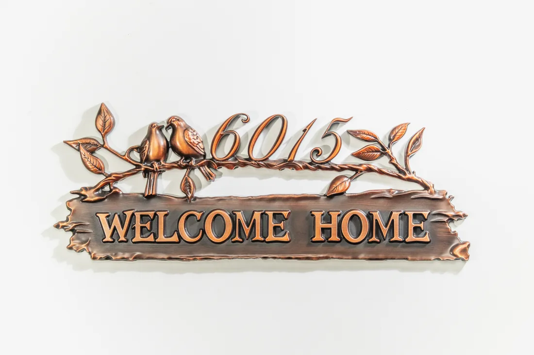 Antique copper WELCOME HOME plaque with birds and number 6015