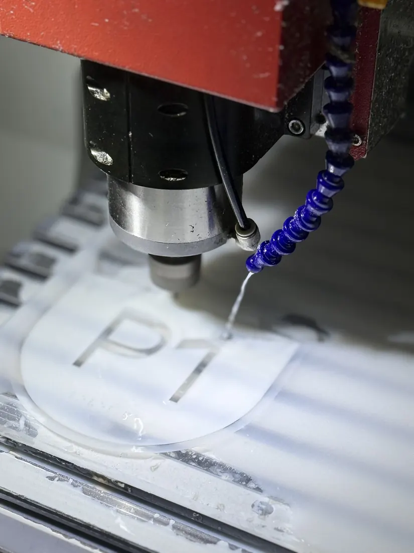 CNC engraving close-up for custom hotel room number sign production