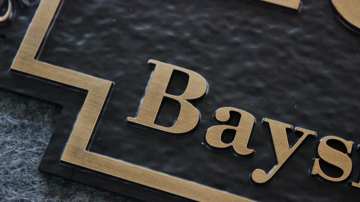 Exterior address plaque detail with raised street name
